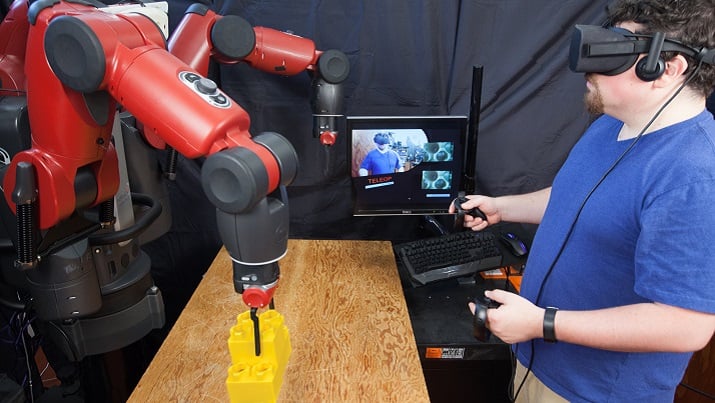 Controlling the Baxter robot through VR. Source: Jason Dorfman/MIT CSAIL