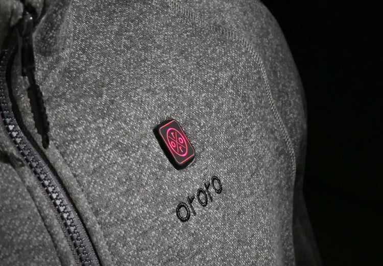 The Soft Shell Heated Jacket by Ororo features four carbon-fiber heating panels for warmth across the chest and upper back. It can be controlled via Bluetooth and last 10 hours. Source: Ororo