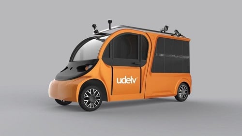 The autonomous delivery truck can carry up to 700 pounds in 18 cargo containers. Source: udelv