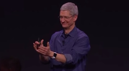 Apple CEO Tim Cook applauds his company's product at the launch event March 9.