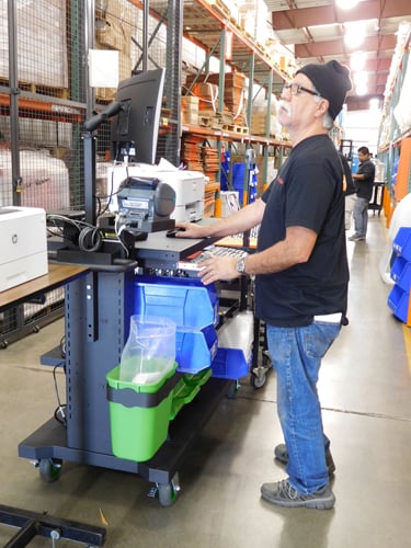 Newcastle Systems customer Direct Relief uses a mobile powered workstation in its Santa Barbara, Calif., warehouse. (Source: Newcastle Systems)