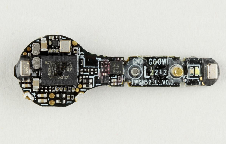 The left earbud board contains MEMS devices as well as audio electronic components for the Quantum earbuds. Source: TechInsights