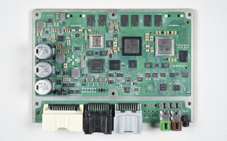 The top side of the main board of the F-150 Lightning ECU contains the main memory and processors for the pickup. Source: TechInsights 