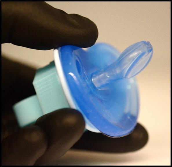 A pacifier biosensor could someday be used to non-invasively monitor glucose in the saliva of infants.(Source: Analytical Chemistry 2019)