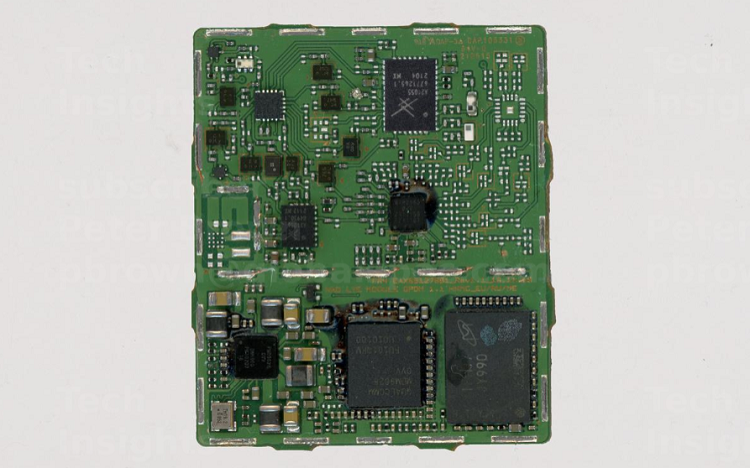 The LTE board contains the electronic components needed for communication updates and real-time maps. Source: TechInsights 