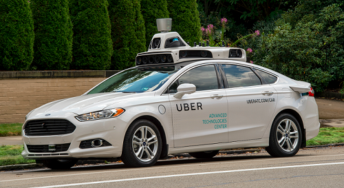 A self-driving car in Pittsburgh after the company launched its pilot program. Source: Uber