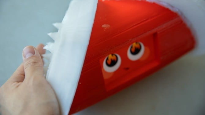 The robot prototype expresses its "anger" with both its eyes and its skin, which turns spiky through fluidic actuators that are inflated under its skin, based on its "mood." Source: Cornell University