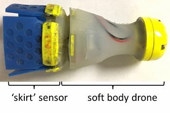 Small variations in pressure are detected by sensing the pull at the edges of its soft rubber skirt, which fills the diameter of the pipe. Image credit: MIT PipeGuard team