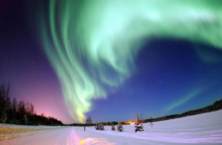 During geomagnetic storms the beautiful aurora borealis, or northern lights, are visible at high latitudes. However, geomagnetic storms can also cause risks to the power grid. (Source: Joshua Strang, US Air Force)