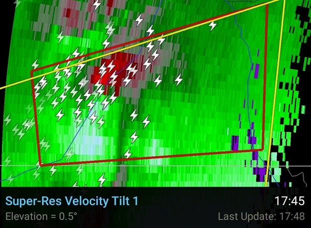 Storm-relative velocity image of a tornadic storm in Texas. This image has a red box highlighting the tornado warning, and lightning markers as well. Notice the bright red and bright green near each other in the tornado warning box. Source: RadarScope software