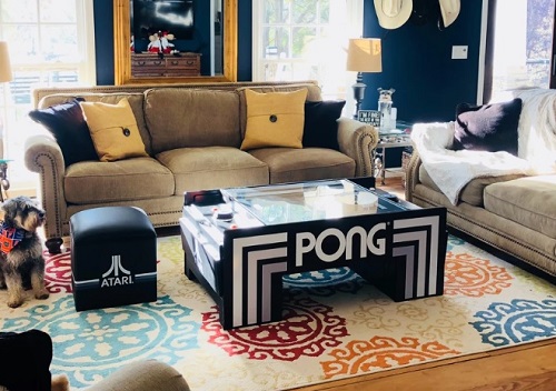 Play Pong, keep magazines on it and put your feet up on this coffee table. Source: Calinfer Inc.