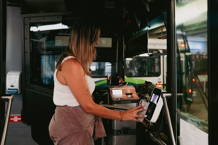 A passenger boards a mass transit system using the software as a service payment option. Source: Cubic Transport Systems 