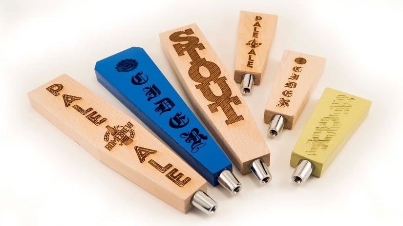Figure 1: Laser engraved beer tap handles. Source: Epilog Laser