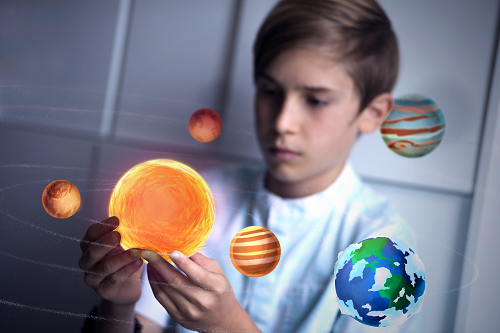 The Merge Cube using Galactic Explorer app to view the solar system in AR. (Source: Merge VR)