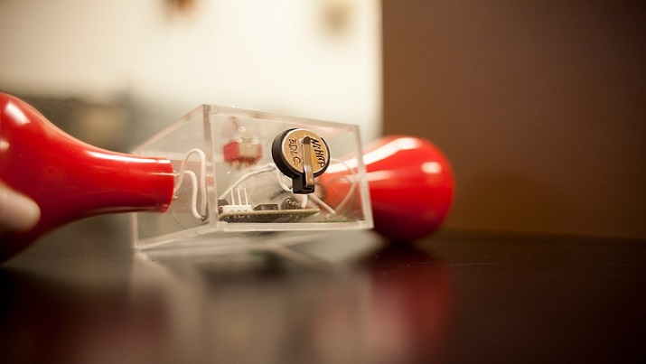 To demonstrate the supercapacitor's ability to store power, the researchers modified an off-the-shelf hand-crank flashlight. (Image Credit: Melanie Gonick via MIT)