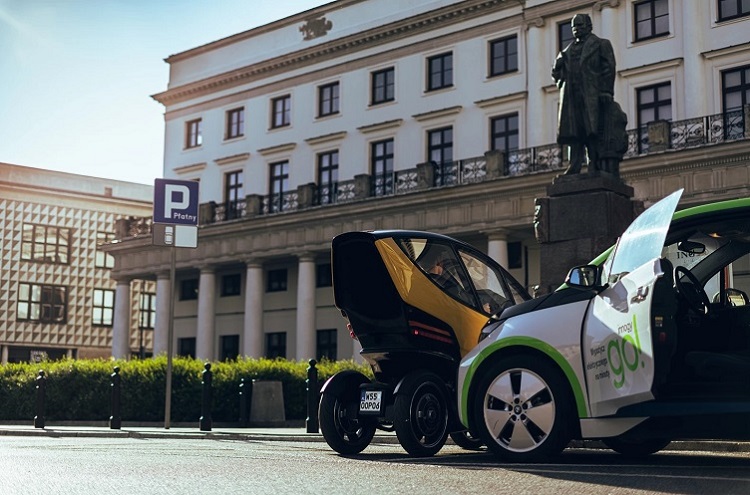 The Triggo electric vehicle maneuvers like a scooter but has more range for urban mobility such as robotaxis and car sharing. Source: Triggo