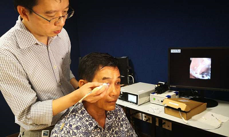 The GonioPEN shown being used to diagnose the patient's type of glaucoma. Source: Nanyang Technological University