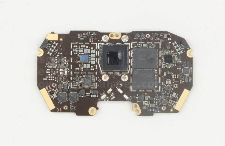 The main board contains the main components of the Meta Quest Pro headset with numerous ICs including the Snapdragon applications processor from Qualcomm and memory from Western Digital and Micron. Source: TechInsights 