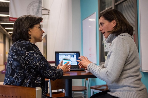 Carolina Ruiz, left, and Bengisu Tulu, are two of the developers of the smartphone app SlipBuddy, which integrates behavioral strategies and technologies like mobile devices, machine learning and text mining to help users avoid overeating. Source: Worcester Polytechnic Institute (WPI)