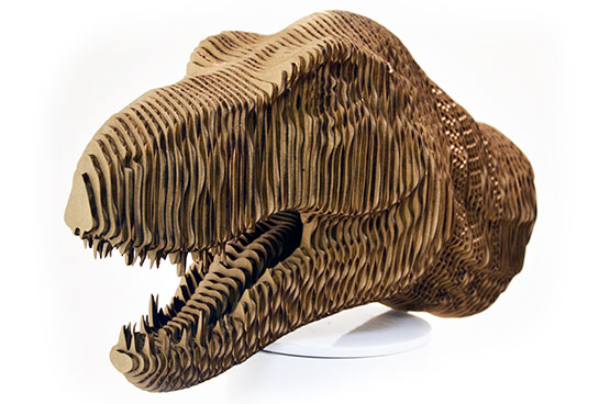 This eye-catching T-Rex head was laser-cut from cardboard. Source: Epilog Laser