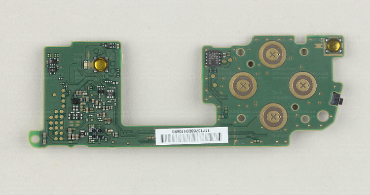 The controller board of the Switch OLED is one of two boards that are used to power the two controllers that are associated with the game console. The components are used for control and communication of the devices. Source: TechInsights 