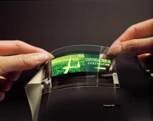 The shift from ridged OLED glass substrates to thin, flexible plastic units promises to deliver flexibility that will enable applications such as daily-refreshable newspapers, wall-size television monitors, walls, windows and partitions that double as computer screens. Credit image: Universal Display.