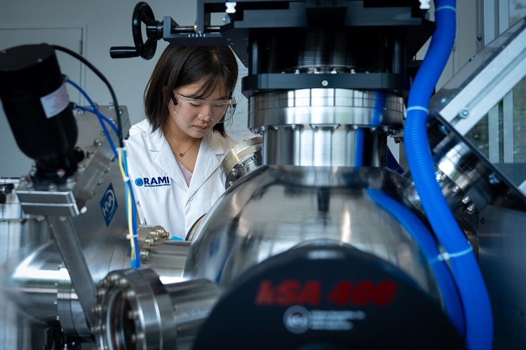 Tae Yeon Kim, a postdoctoral researcher at Rice University, works in the lab that created a multiferroic material that has a high performance at room temperature. Source: Rice University