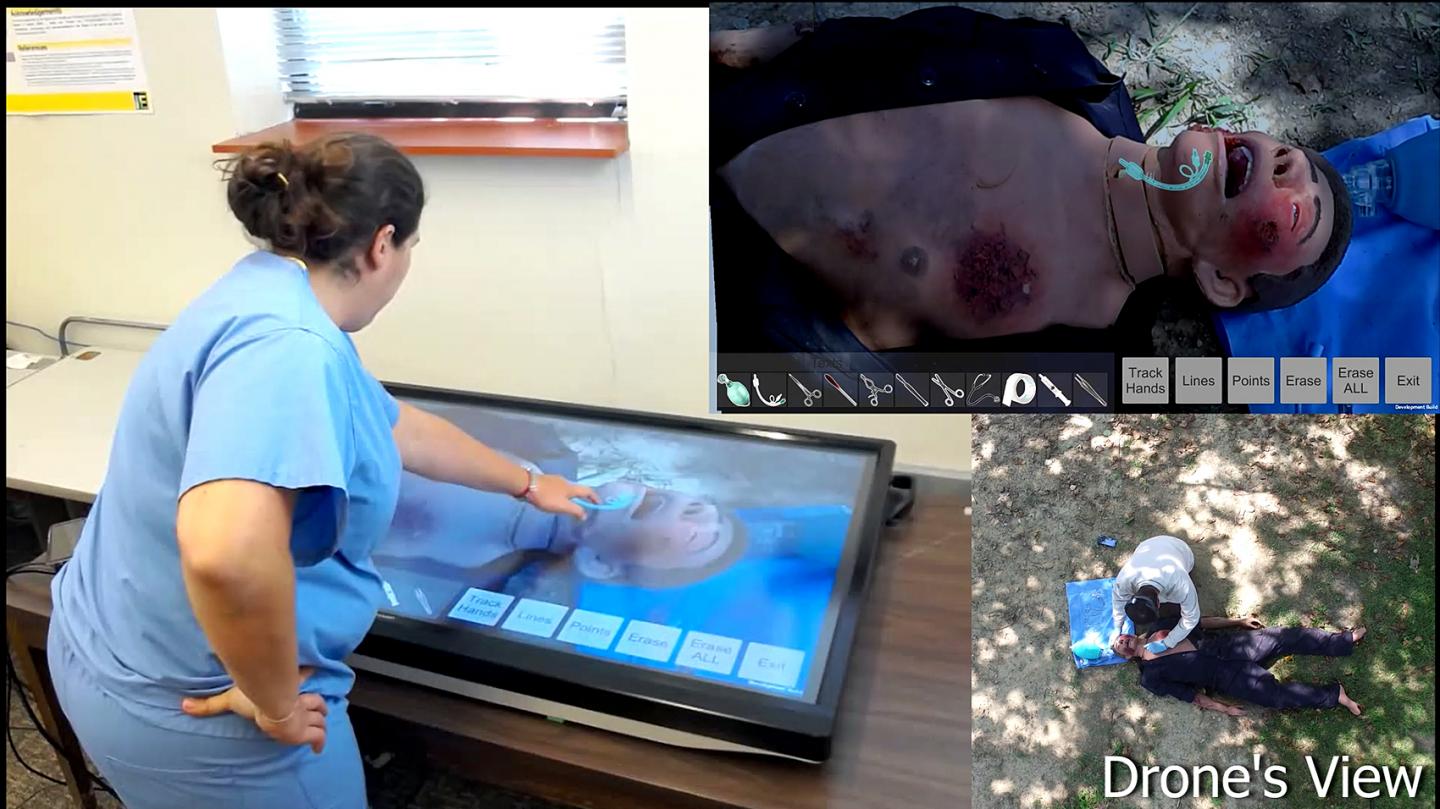 Purdue University researchers have developed a unique approach using augmented reality tools to help less-experienced doctors in war zones, natural disasters and in rural areas perform complicated procedures. Source: Edgar Rojas Muñoz/Purdue University