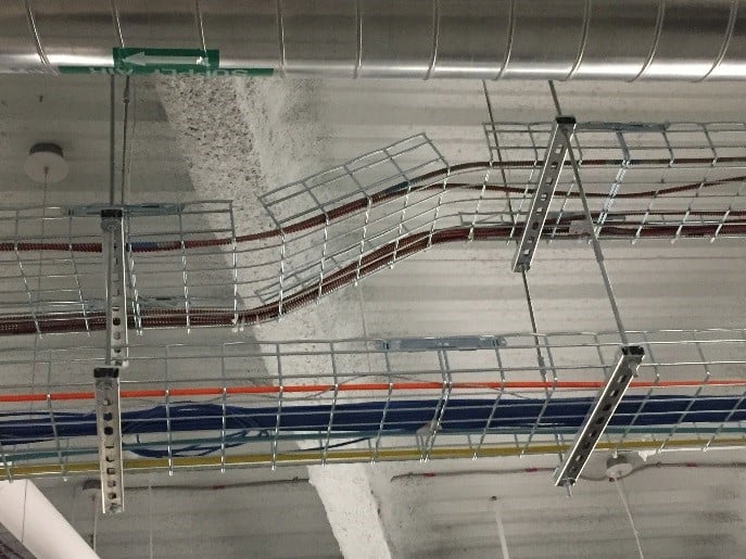 Figure 1: Wire mesh trays showing separation of power and data cables in an office building. 