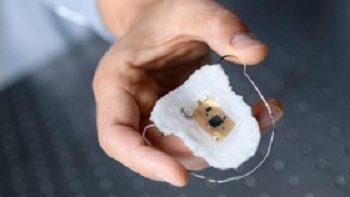 The intraoral electronics with a sodium sensor is based on a breathable elastomeric membrane that resembles a dental retainer. The ultrathin device is flexible and stretchable, and can wirelessly transmit data up to 10 meters. Source: Rob Felt, Georgia Institute of Technology