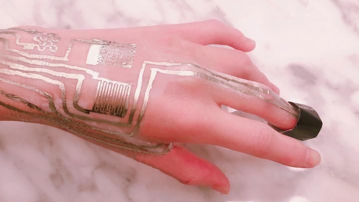 With a novel layer to help the metallic components of the sensor bond, an international team of researchers printed sensors directly on human skin. Source: Ling Zhang, Penn State/Cheng Lab and Harbin Institute of Technology