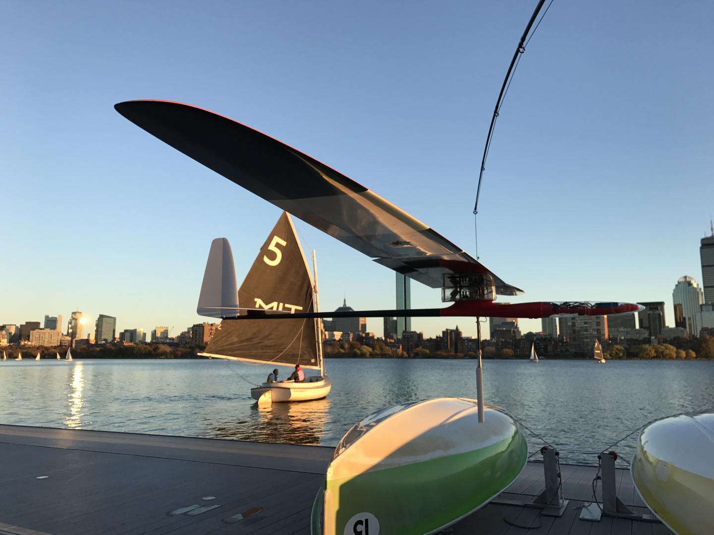 An albatross glider, designed by MIT engineers, skims the Charles River. (Source: Gabriel Bousquet)