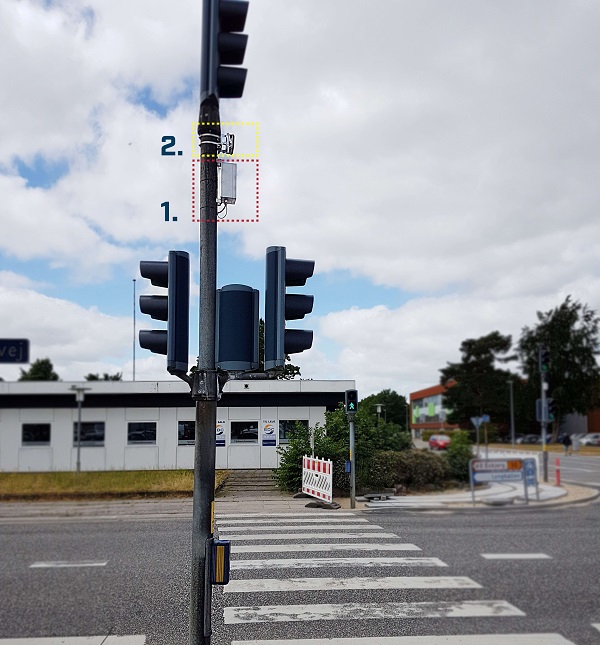 The Anybus Wireless Bridge II (1.) is connected to the radar (2.) via a single serial cable and paired with another Anybus Wireless Bridge II in the control cabinet. Source: HMS Industrial Networks
