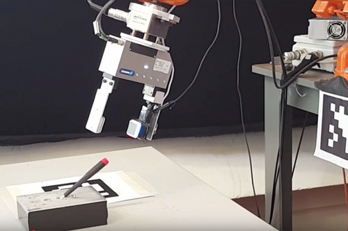 A robotic gripper with the GelSight sensor was able to grasp a small screwdriver removing it from and inserting it back into a slot. (Source: MIT)
