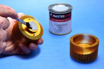 Thermally conductive adhesives like Master Bond’s Supreme 10AOHT can be used to create a thermal interface between heat sinks and electronic components. Source: Master Bond, Inc.