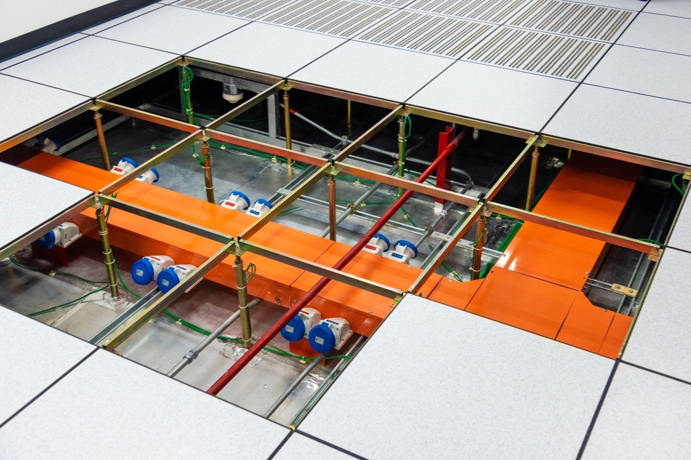 Figure 2. Example of raised floor data center wiring. Source: Sutiwat Jutiamornloes/Shutterstock