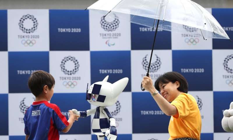 A robotic version of Tokyo's mascot for the 2020 Olympics was unveiled at a ceremony marking one-year until the Games begin. Source: AFP 