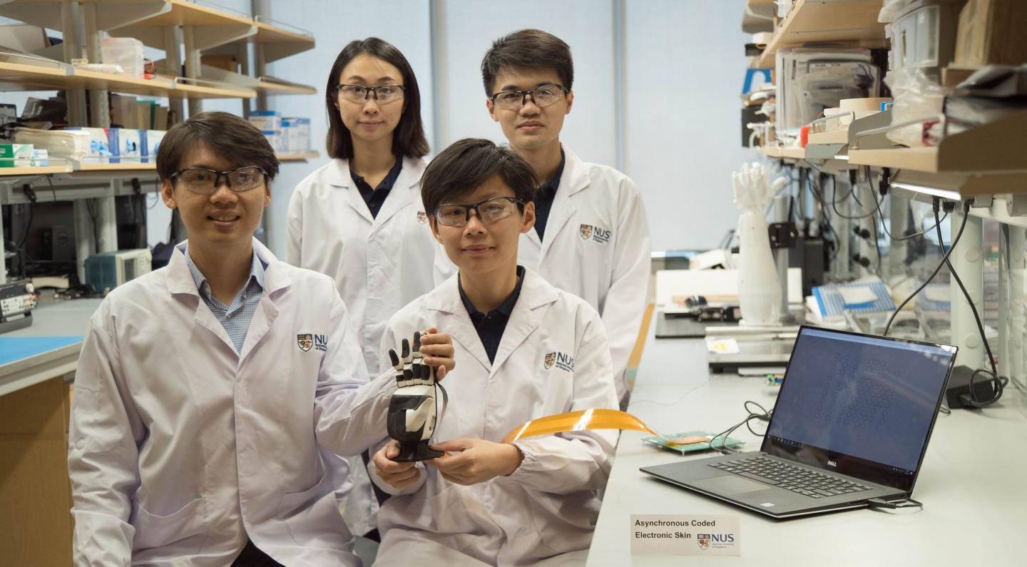 The Asynchronous Coded Electronic Skin (ACES) developed by Assistant Professor Benjamin Tee (left in front row) and his team responds 1000 times faster than the human sensory nervous system. Source: National University of Singapore