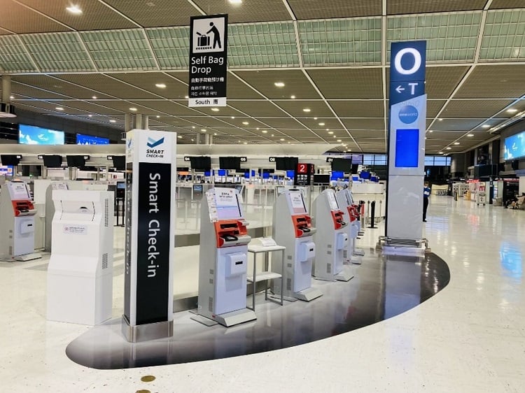 A smart check in at the Narita airport in Japan. Intelligent systems are likely to begin in the transportation sectors such as airports and bus stations in future smart cities. Source: Leon Timog