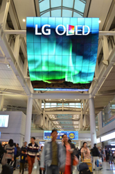 LG’s huge display is made up of 140 55-inch curved OLED panels and measures 13 meters high. Source: LG